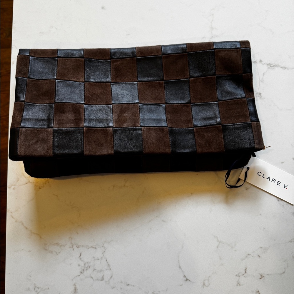 Clare V Black and Brown Checkered Messenger Bag
Tabs inside